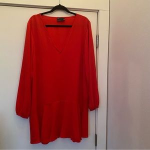 2 ASOS lightly sheer gently worn drop waist tunics with ruffled bottom.